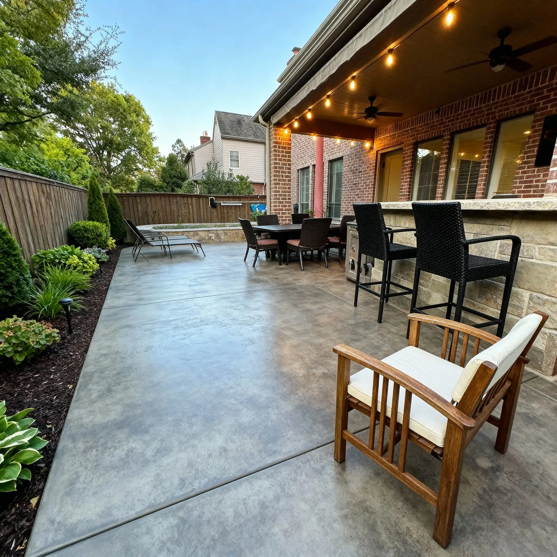 Luxury outdoor living spaces featuring a bioclimatic pergola with motorized louvers, an integrated smokeless fire pit, and permeable paver patios to manage 2026 stormwater runoff.